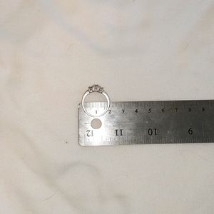 Triple diamond and white gold ring